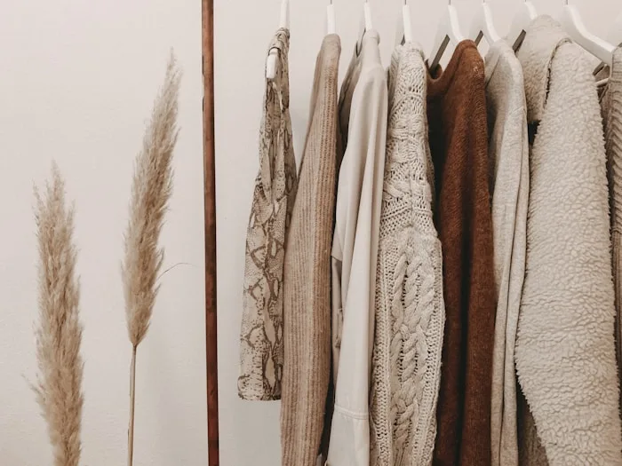 Neutral sweaters and pampas grass create a calming beige aesthetic for fashion design training at CAQA Creative.