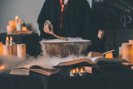 Potion Making | CAQA Creative A cauldron bubbles with a potion as someone practices wizardry, showcasing creative arts.
